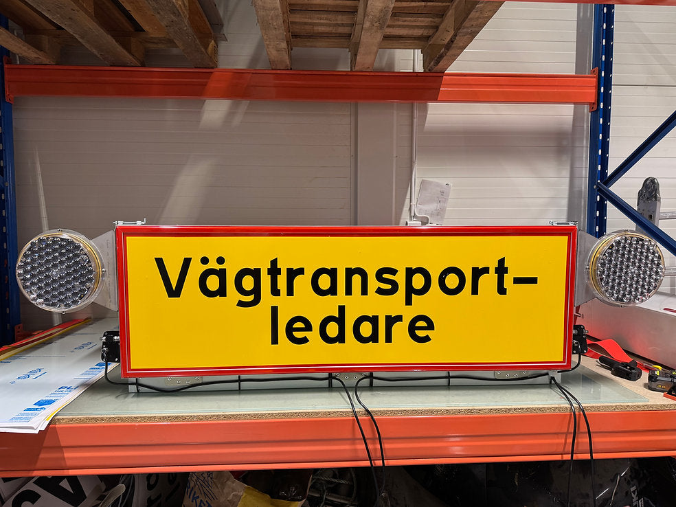 Varningsskylt för motoriserad ensam vägtransportledare
